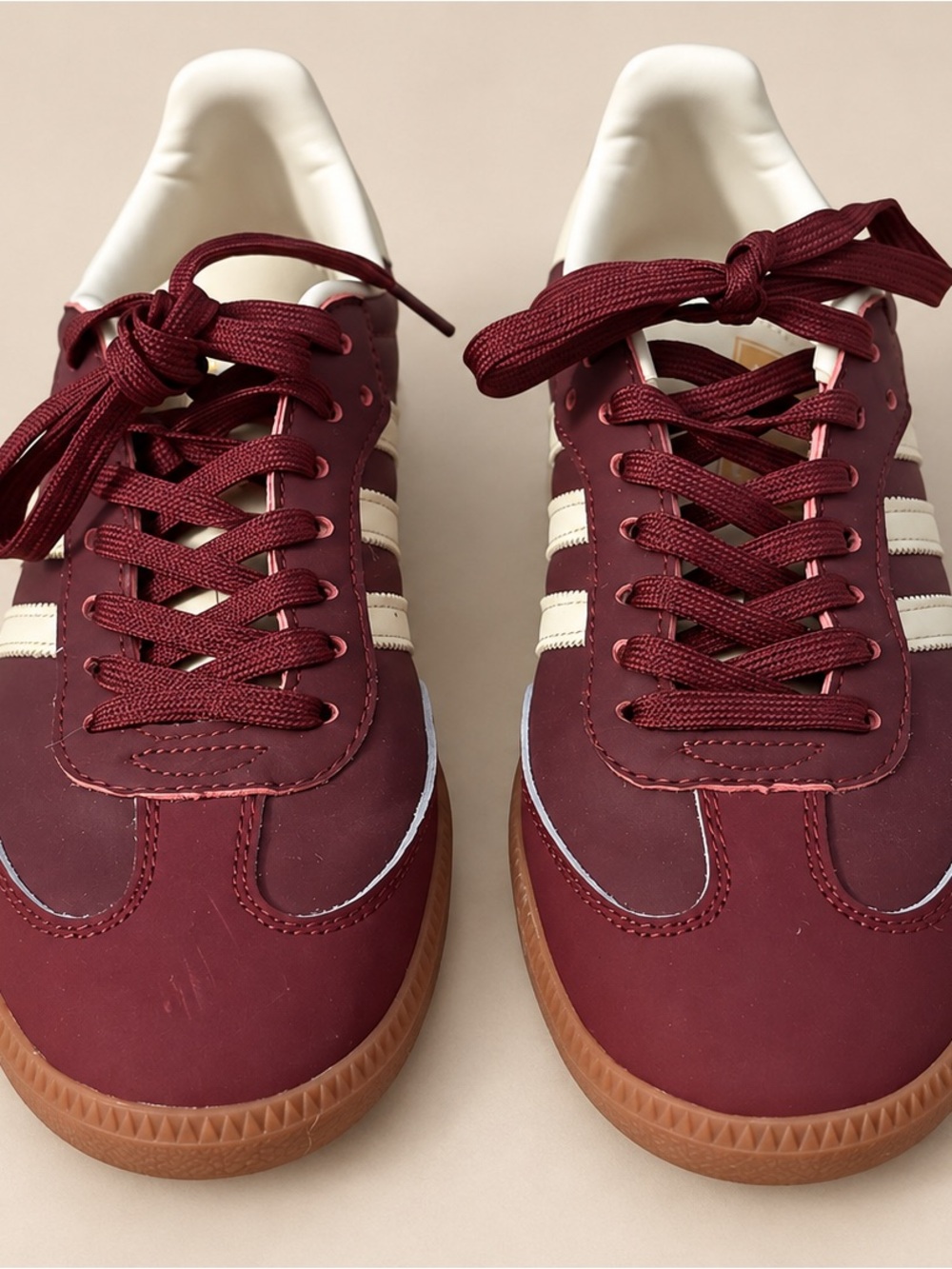 Adidas Women’s Burgundy Sneakers with Cream Stripes